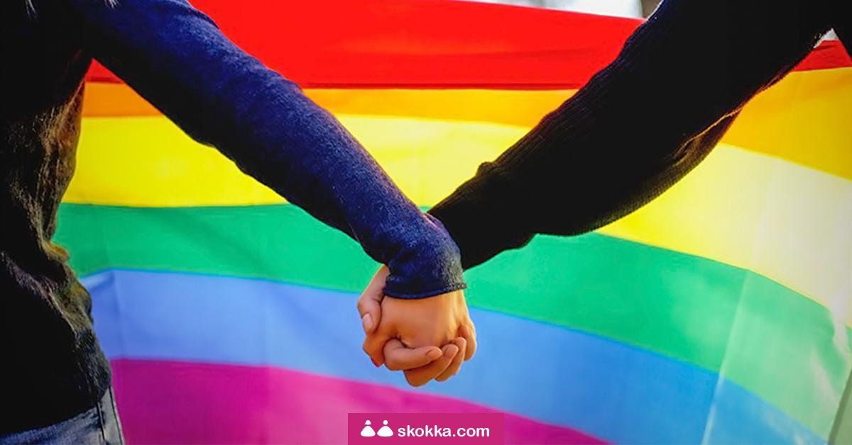 LGBT+ flag with hands